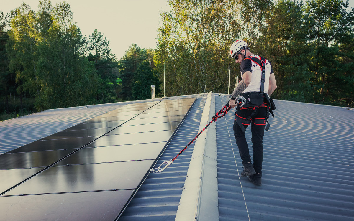 photovoltaic maintenance on a metal roof